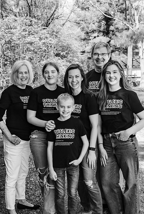 Nancy and her family wearing Dyslexic Thinking t-shirts outdoors